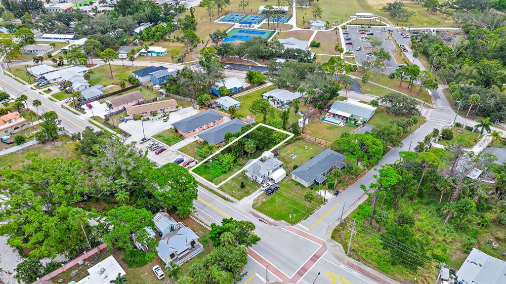Colonia Lane Nokomis, FL 34275 - Photo 2 of 15 an aerial view of residential houses with outdoor space and trees