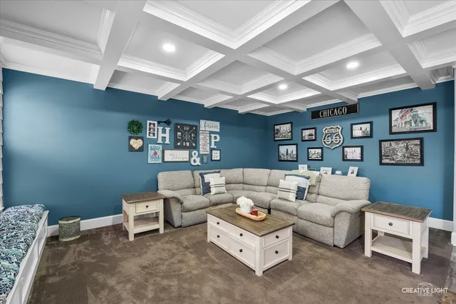 a view of a dining room with furniture a chandelier and wooden floor