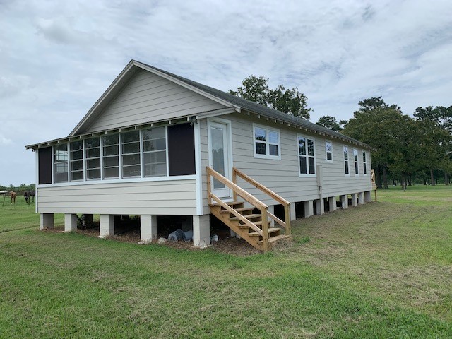 29231 Sheffield Road Waller, TX 77484 - Photo 12 of 18 a view of a house with a backyard