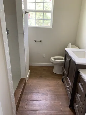 a bathroom with a toilet and a sink