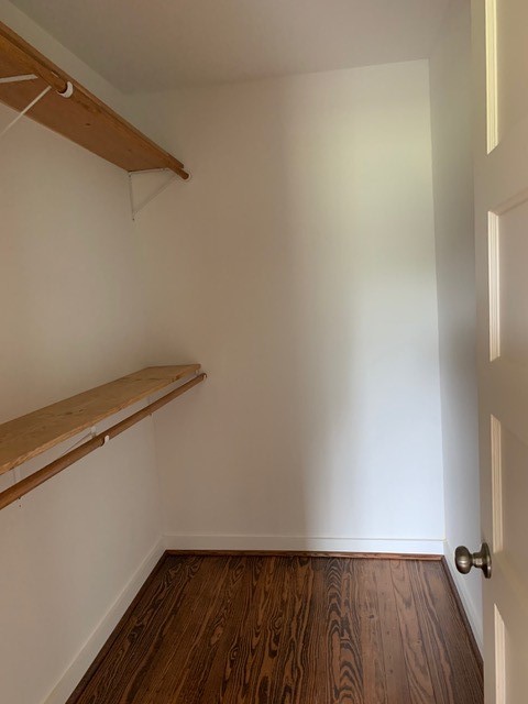 29231 Sheffield Road Waller, TX 77484 - Photo 9 of 18 a view of a room with wooden floor and fan