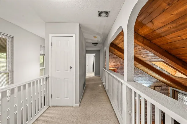 a view of a stairs and an entryway