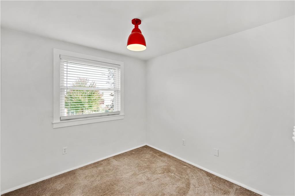 226 Briar Path Imperial, PA 15126 - Photo 18 of 33 an empty room with window and ceiling fan