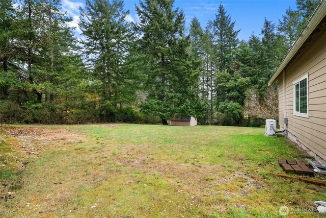 a view of a house with a big yard