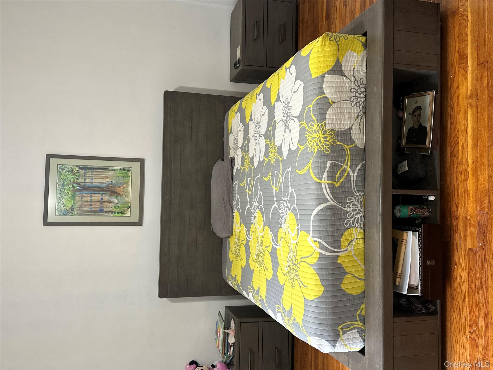 34-10 75th Street, Unit 3L Queens, NY 11372 - Photo 17 of 18 Bedroom featuring wood finished floors