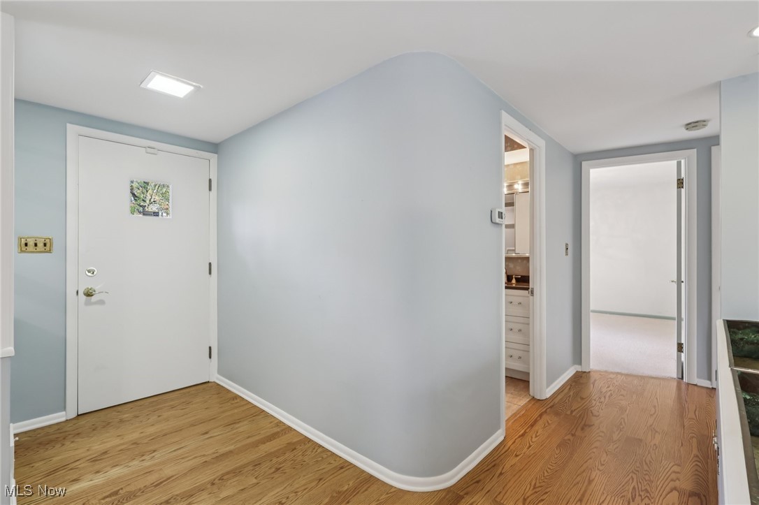 33300 South Woodland Road Cleveland, OH 44124 - Photo 7 of 50 Entryway featuring light wood finished floors and baseboards