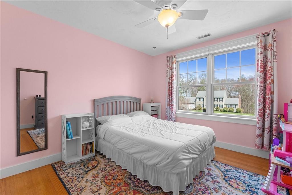 50 Quabbin Path Sutton, MA 01590 - Photo 30 of 42 a bedroom with a bed and a window