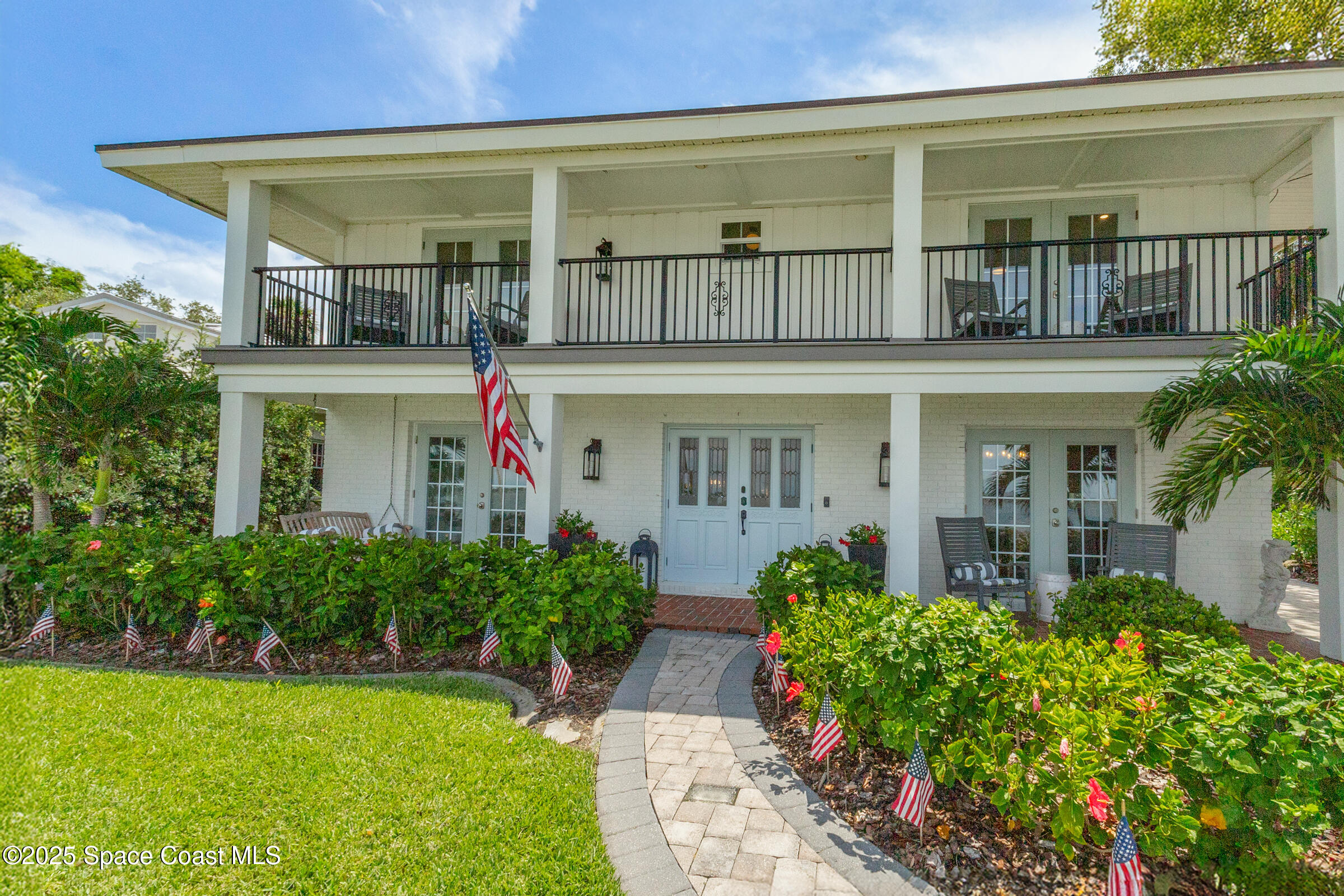 1307 Rockledge Drive Rockledge, FL 32955 - Photo 11 of 75 front view of a house with a yard
