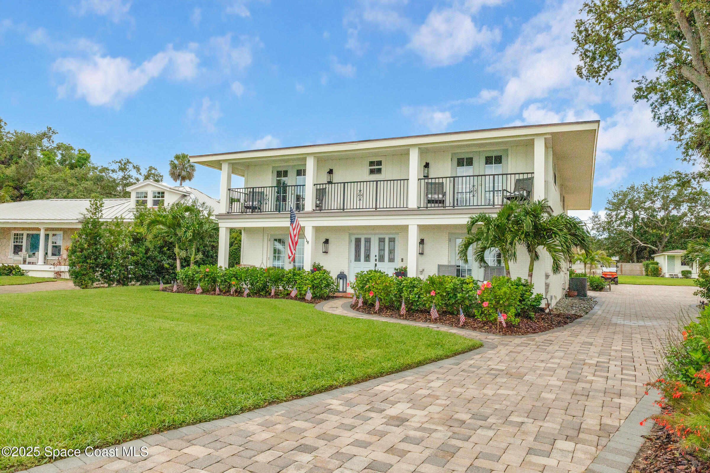 1307 Rockledge Drive Rockledge, FL 32955 - Photo 2 of 75 a front view of house with yard and green space