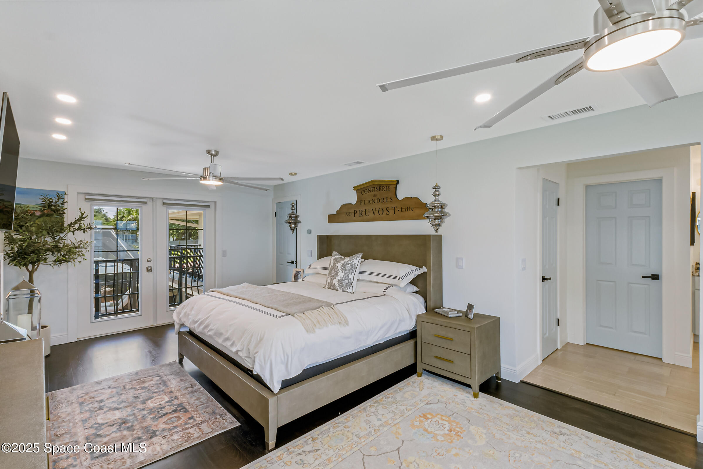 1307 Rockledge Drive Rockledge, FL 32955 - Photo 31 of 75 a bedroom with a bed and large window