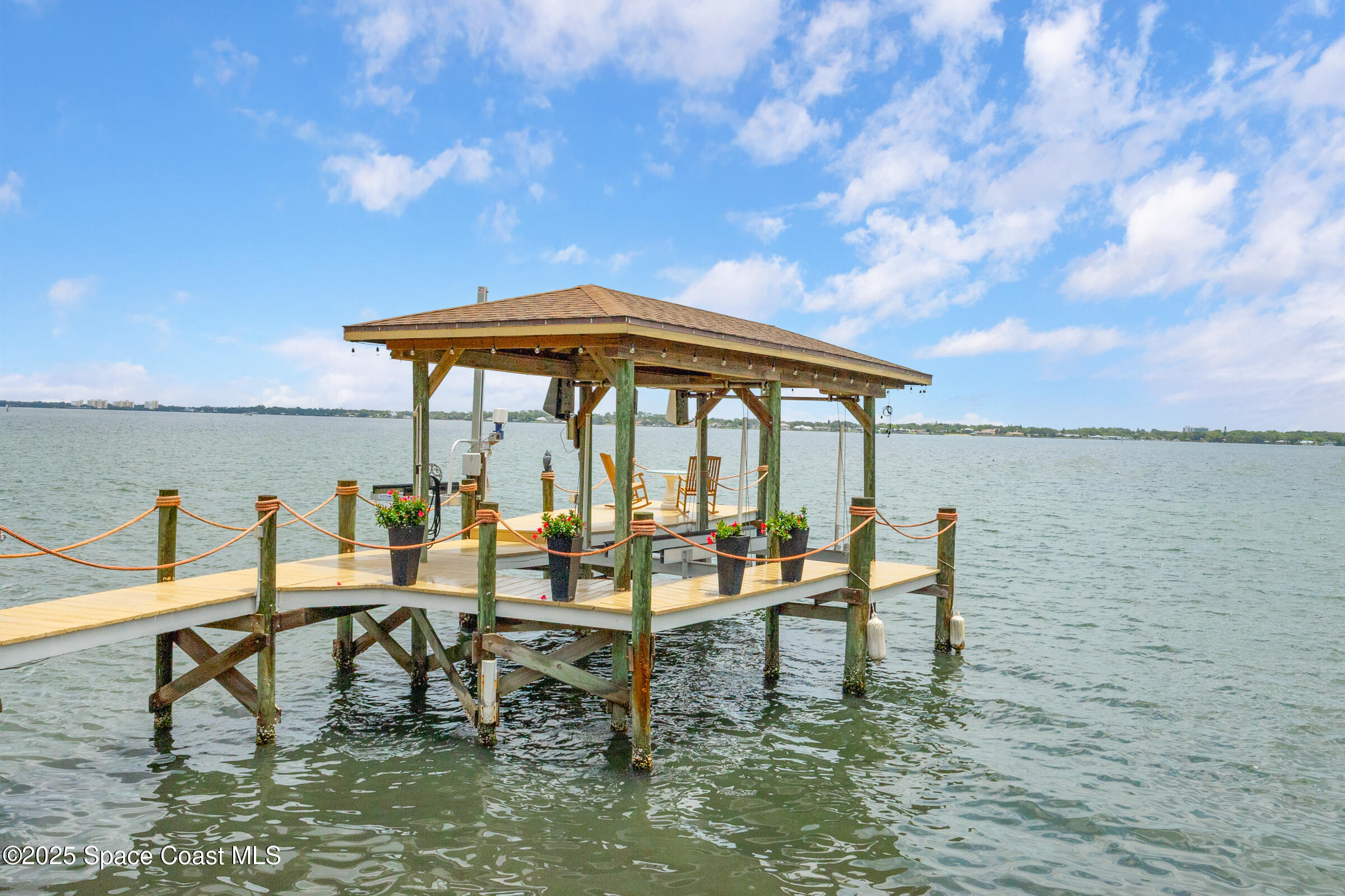 1307 Rockledge Drive Rockledge, FL 32955 - Photo 4 of 75 a view of chairs and table in patio