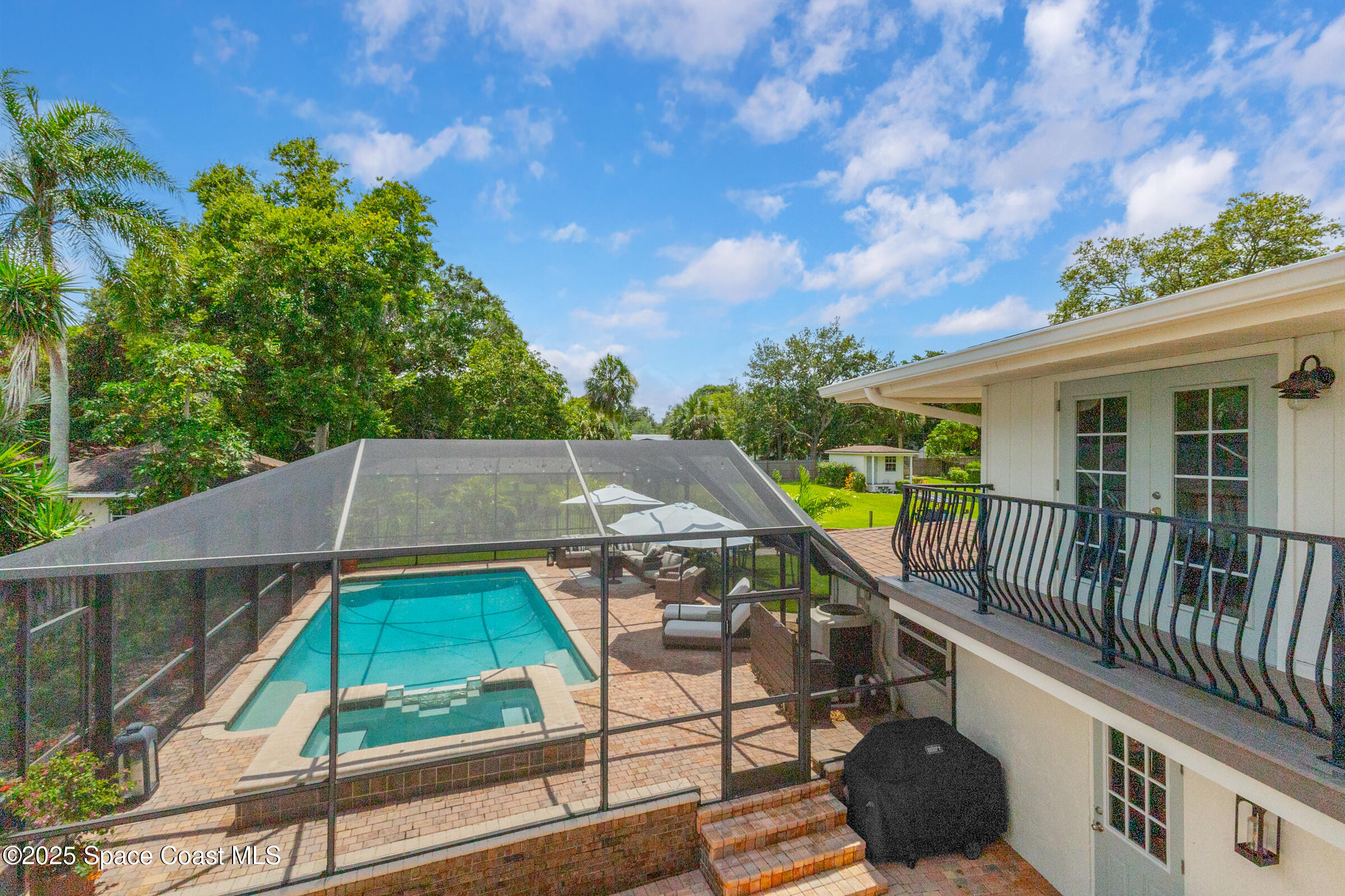 1307 Rockledge Drive Rockledge, FL 32955 - Photo 47 of 75 a balcony with table and chairs