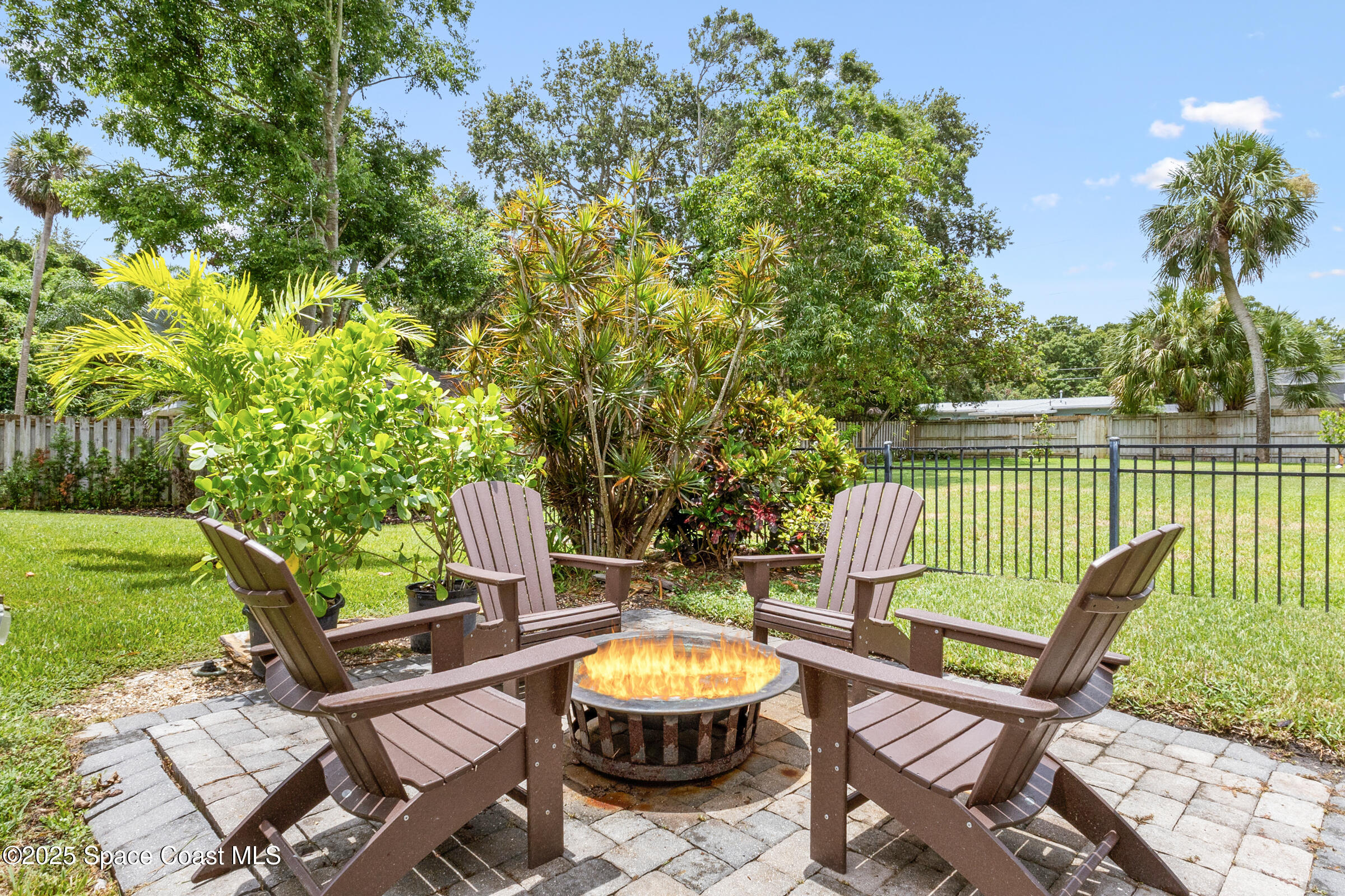 1307 Rockledge Drive Rockledge, FL 32955 - Photo 56 of 75 a view of a chairs and table in the yard