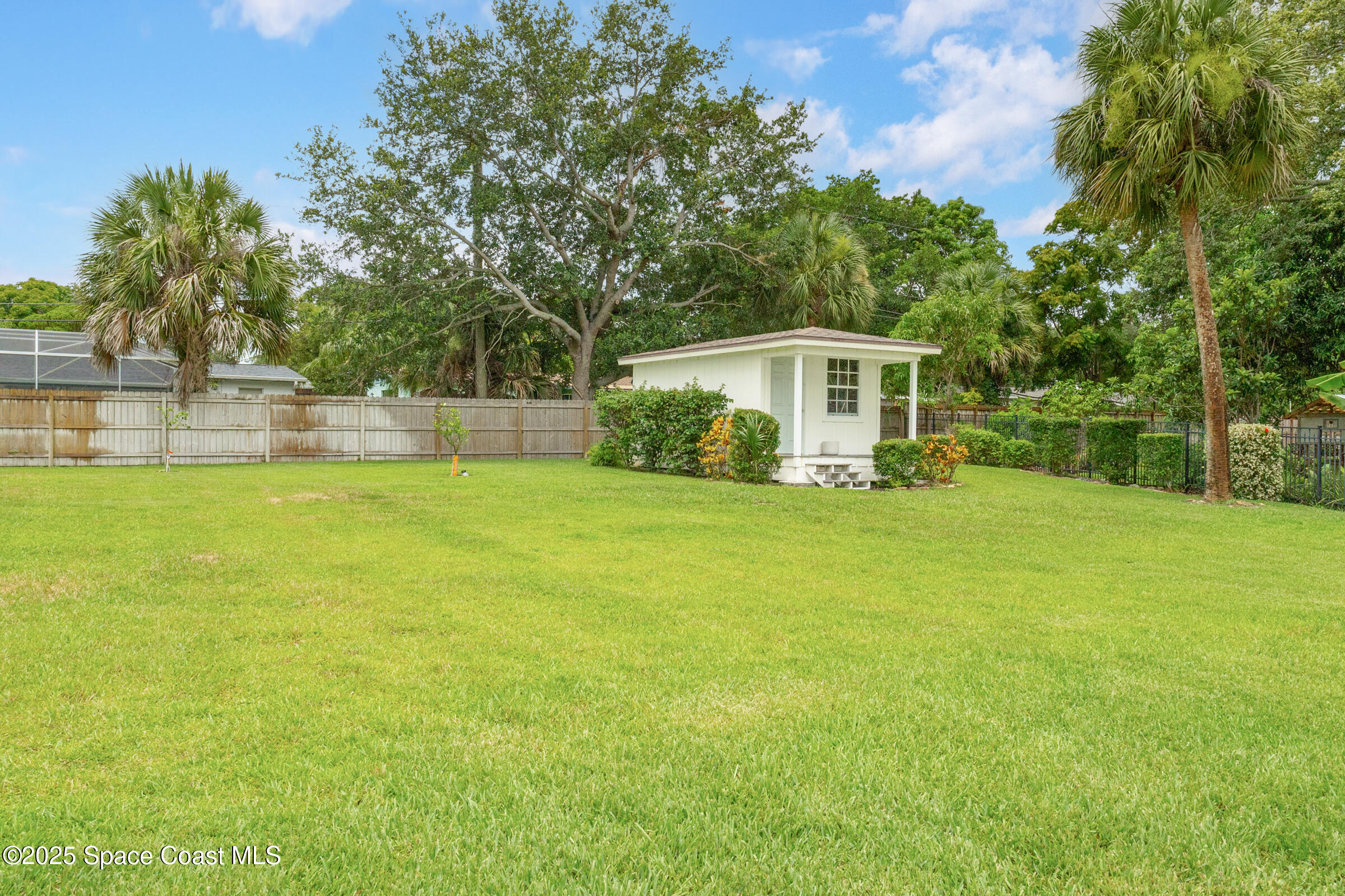 1307 Rockledge Drive Rockledge, FL 32955 - Photo 58 of 75 a view of a house with a yard and sitting area