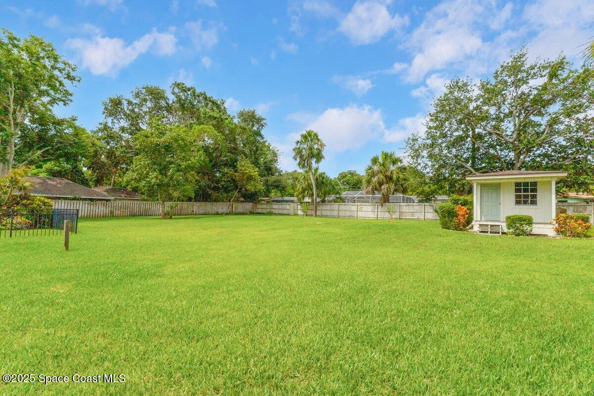 1307 Rockledge Drive Rockledge, FL 32955 - Photo 60 of 75 a view of outdoor space with deck and yard