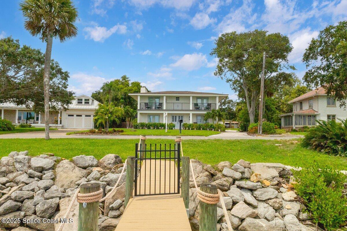 1307 Rockledge Drive Rockledge, FL 32955 - Photo 66 of 75 a garden with plants and large trees