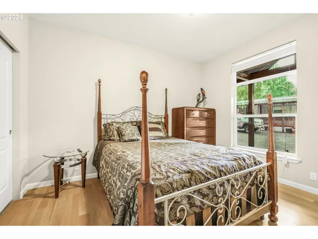 a bed room with a bed and a table