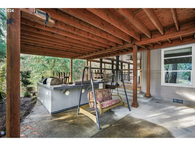 a living room with furniture and a patio