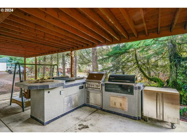 a kitchen with a stove and a microwave