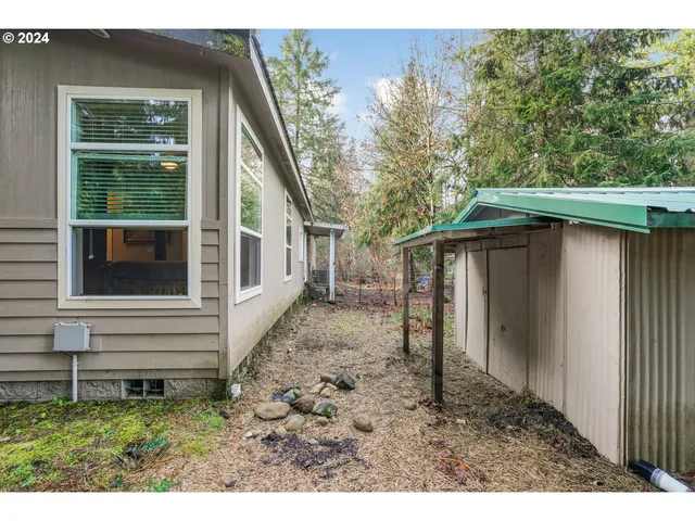 a backyard of a house with lots of green space