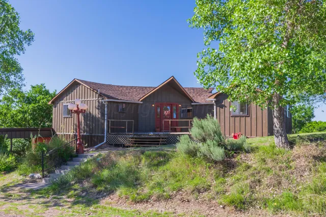 a house view with a garden space