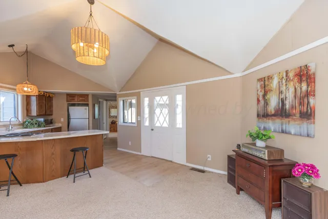 a large living room with a large window