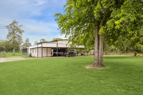 a view of a big yard next to a house