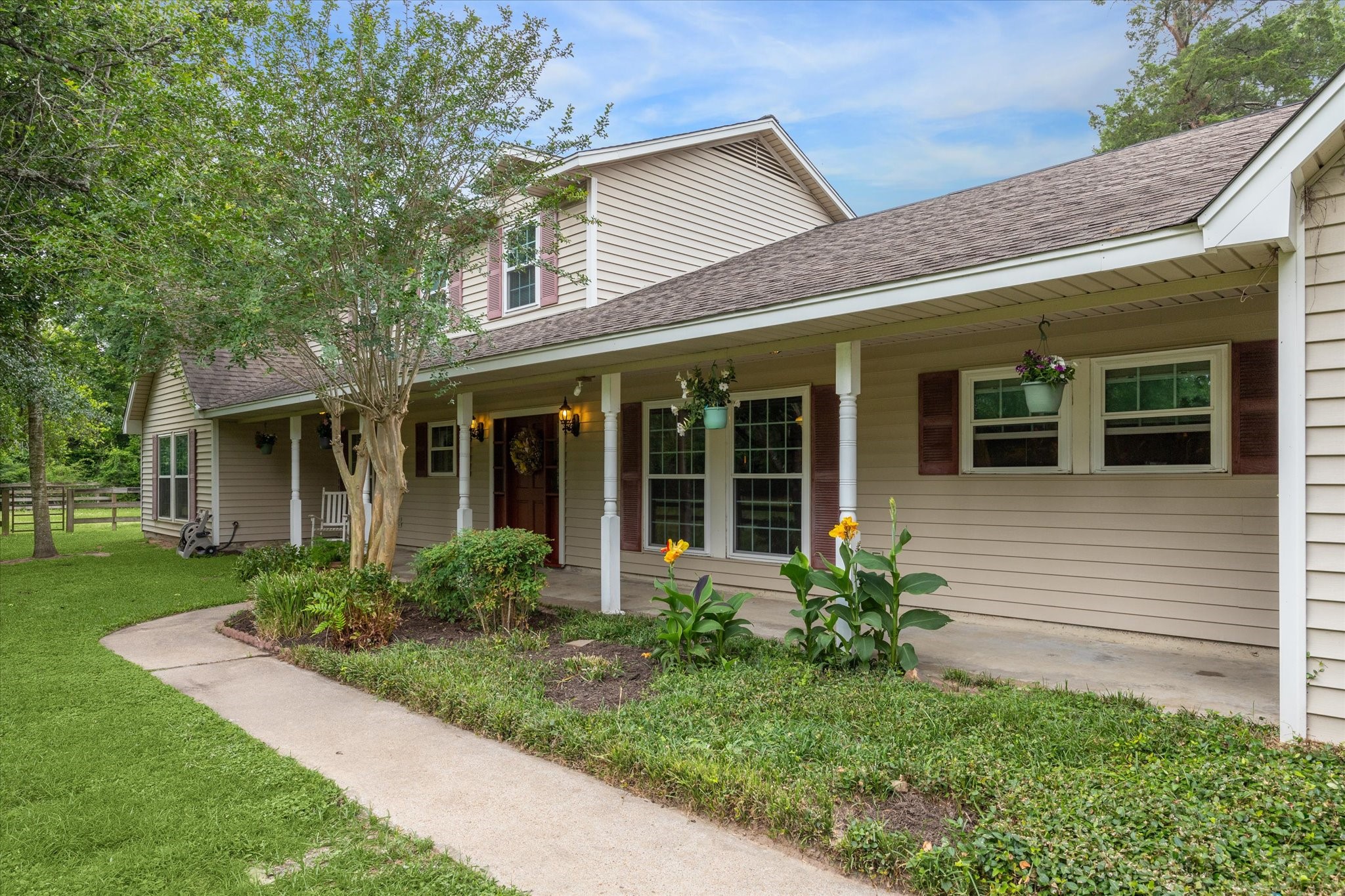 17814 Seidel Cemetary Road Tomball, TX 77377 - Photo 5 of 30 a front view of a house with garden