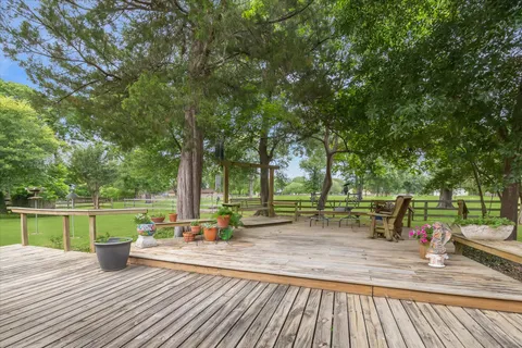 a view of a park with sitting area