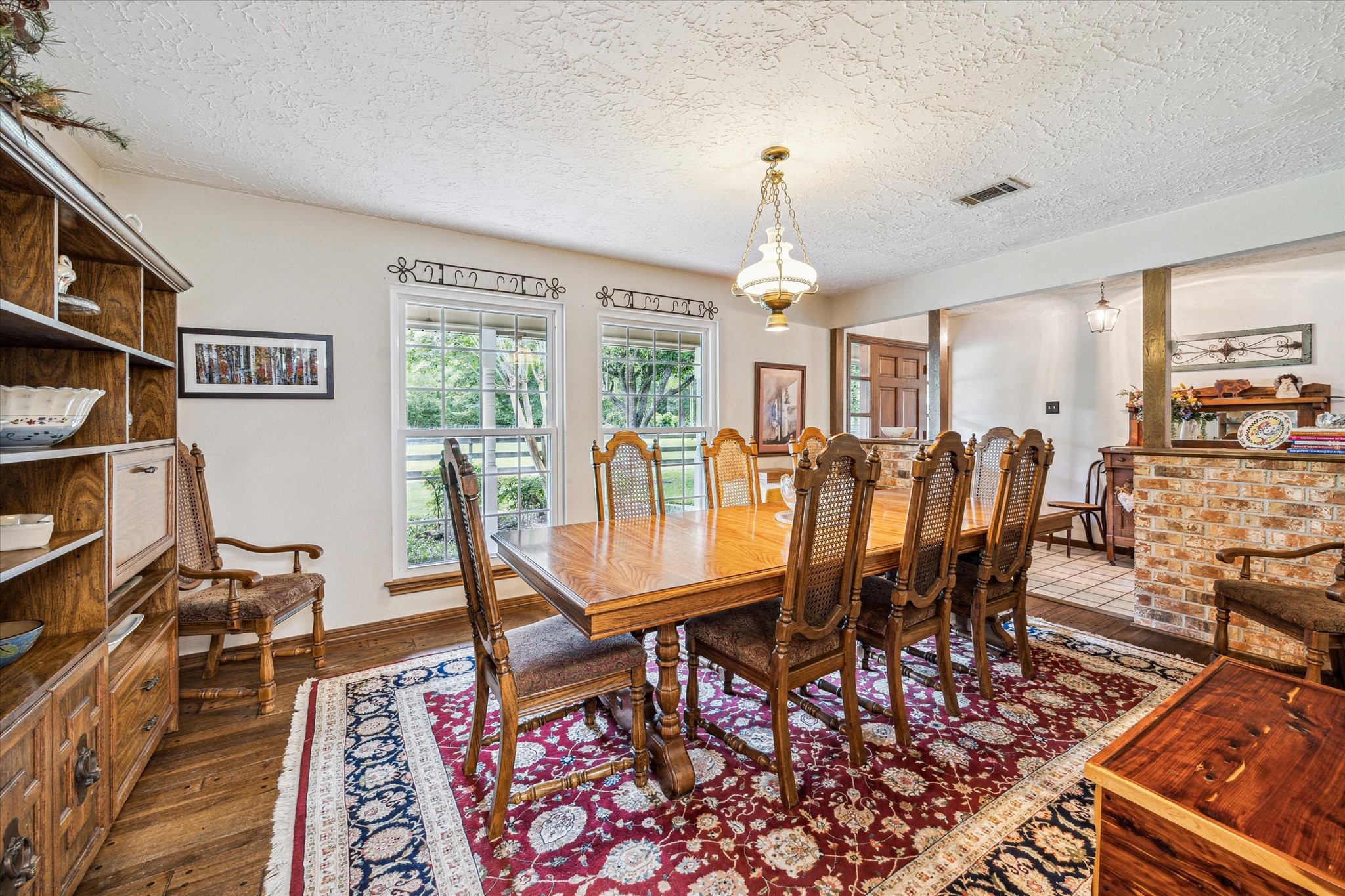 17814 Seidel Cemetary Road Tomball, TX 77377 - Photo 9 of 30 a view of a dining room with furniture window and wooden floor