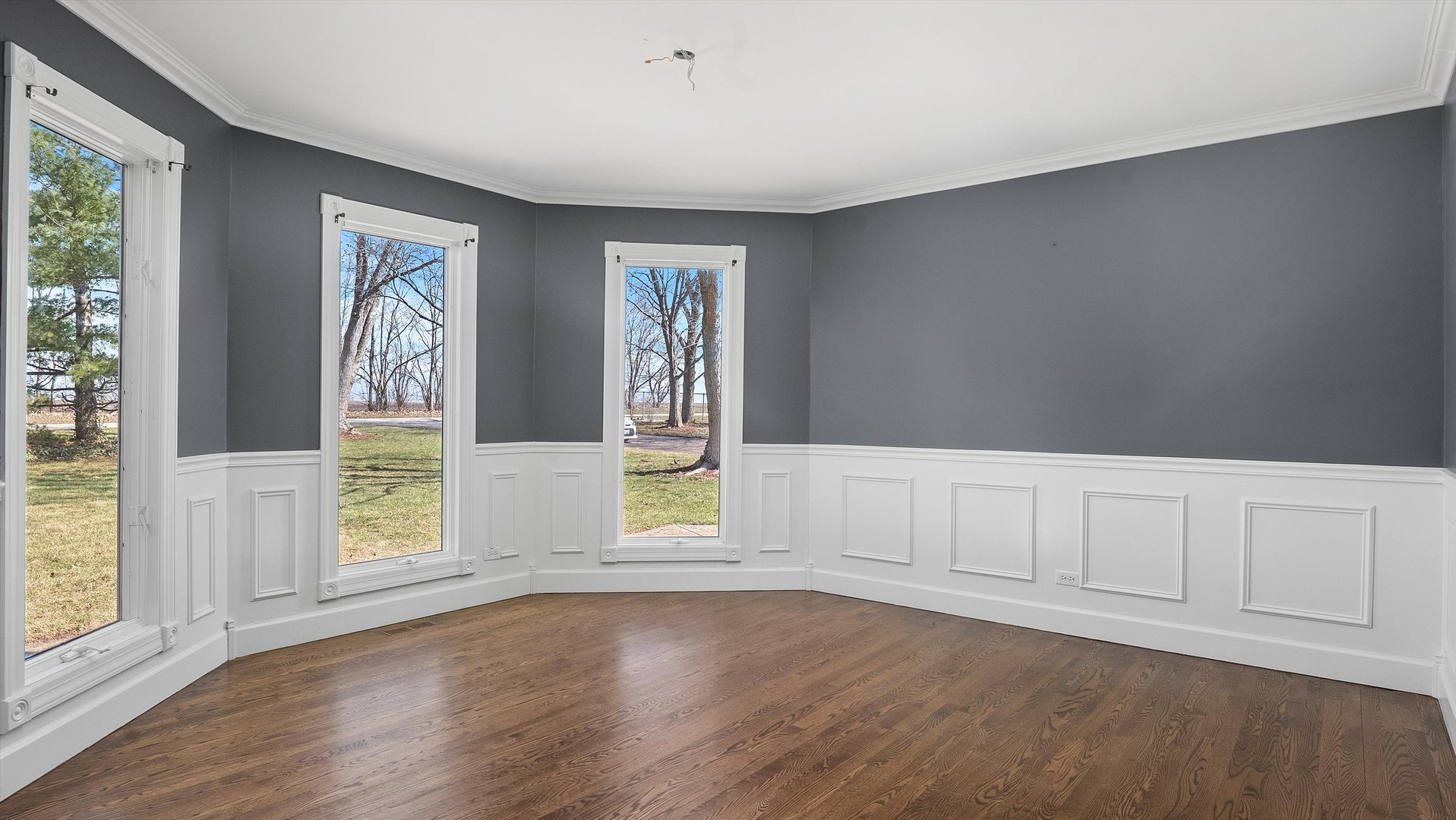 Undisclosed Address Elwood, IL 60421 - Photo 15 of 41 an empty room with wooden floor and windows