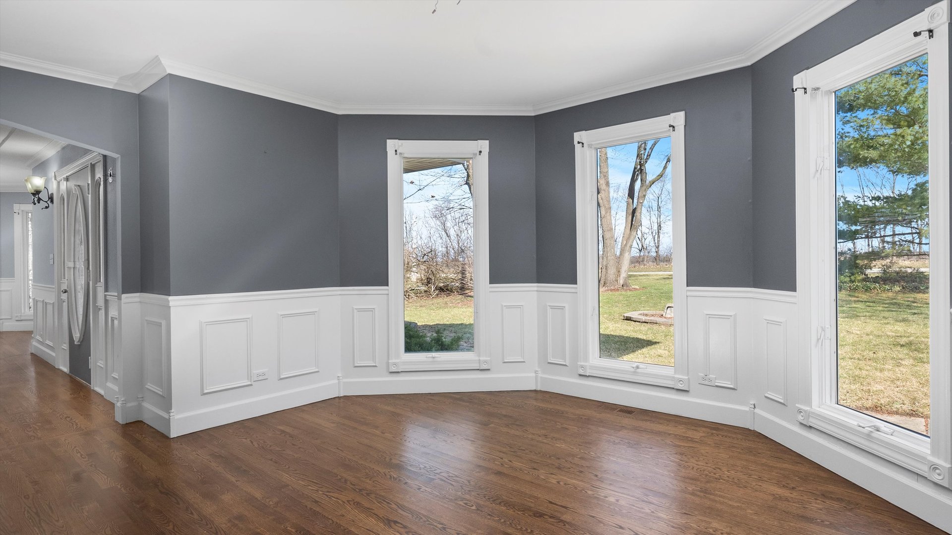 Undisclosed Address Elwood, IL 60421 - Photo 16 of 41 an empty room with wooden floor and windows