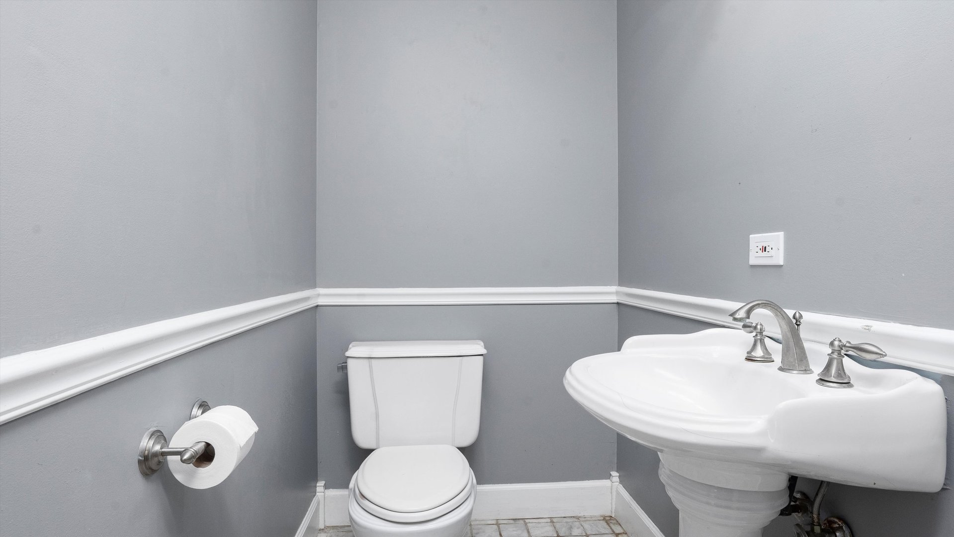 Undisclosed Address Elwood, IL 60421 - Photo 17 of 41 a bathroom with a toilet a sink and mirror