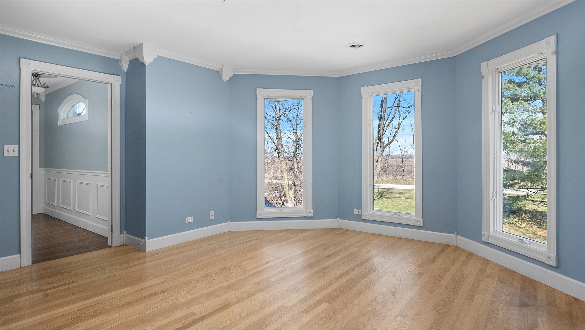 Undisclosed Address Elwood, IL 60421 - Photo 26 of 41 a view of an empty room with window and wooden floor