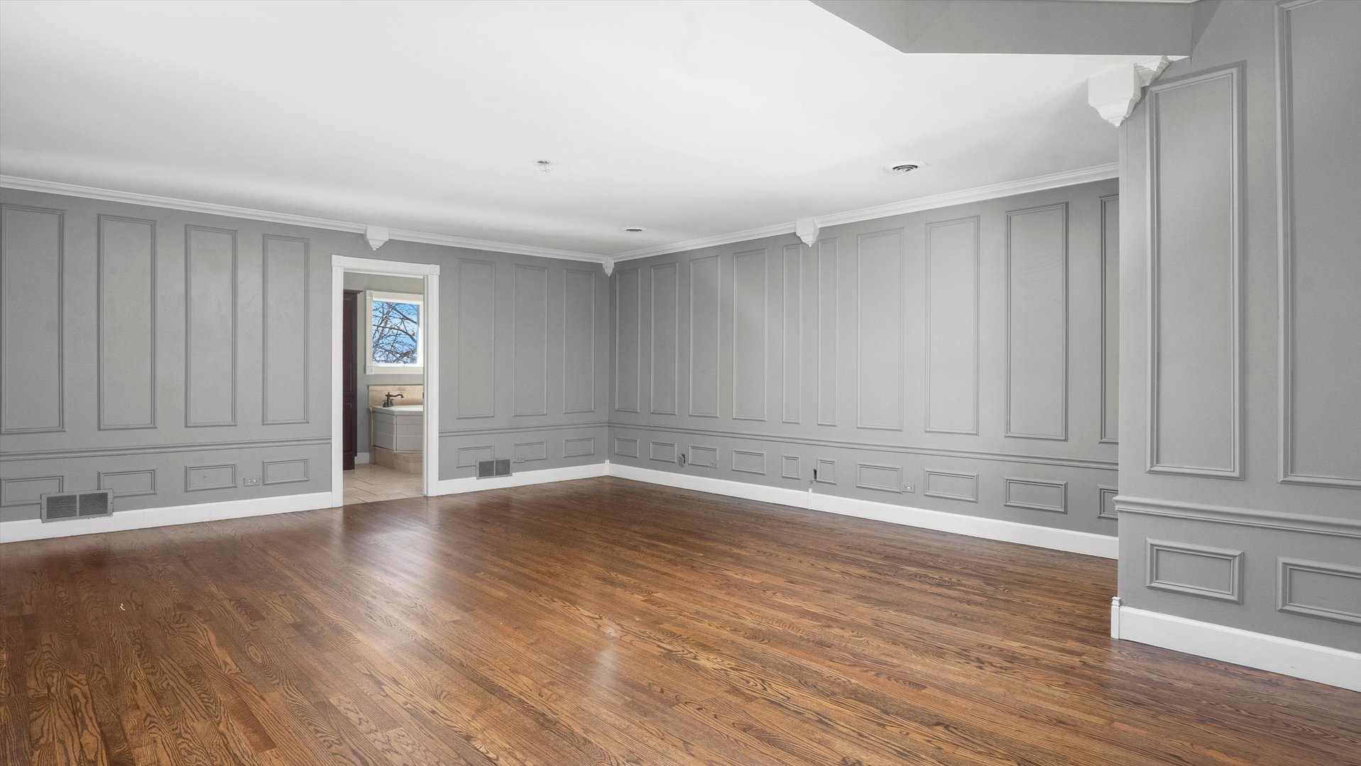 Undisclosed Address Elwood, IL 60421 - Photo 27 of 41 a view of wooden floor and windows in a room