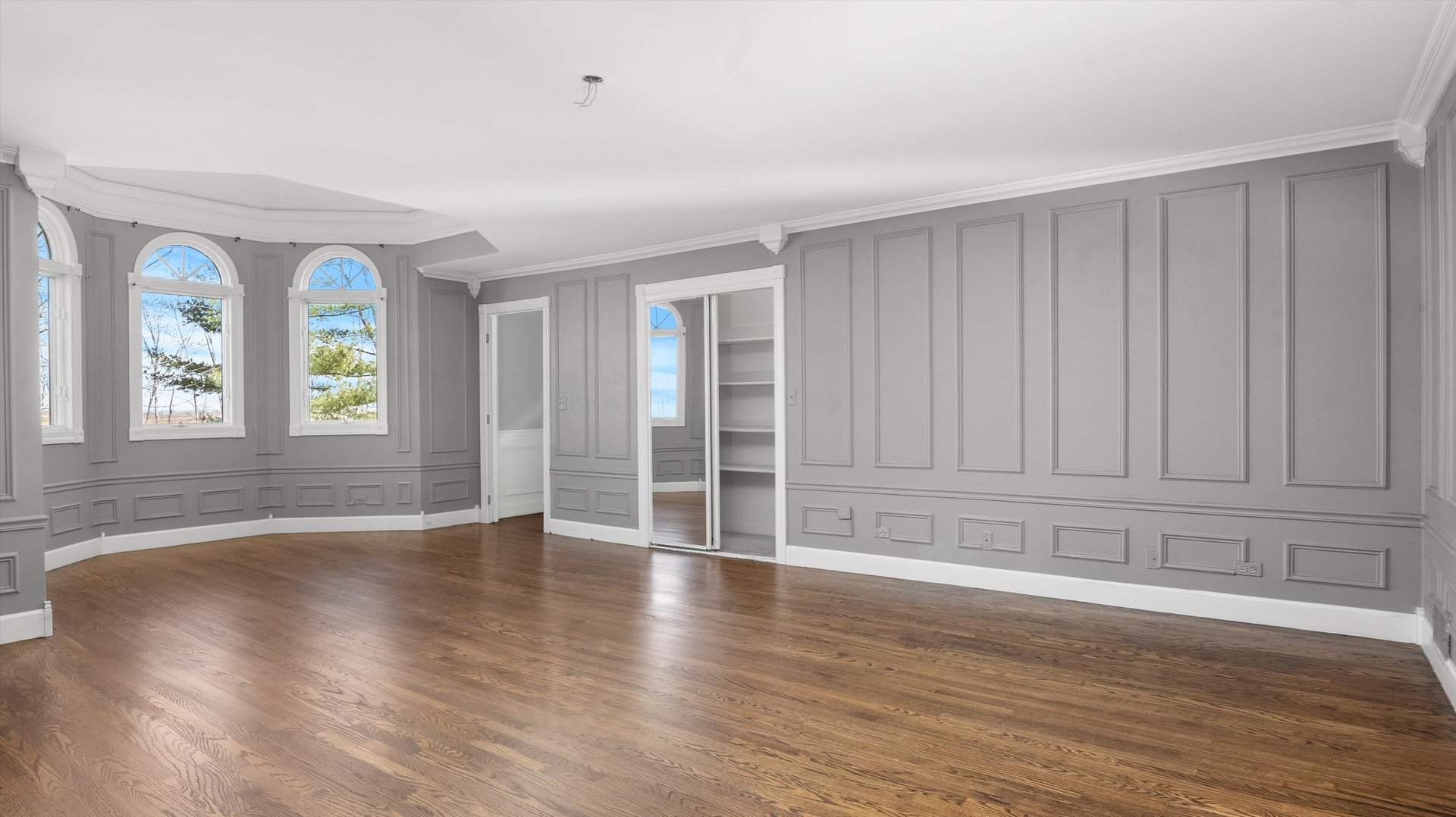 Undisclosed Address Elwood, IL 60421 - Photo 28 of 41 a view of an empty room with wooden floor and a window