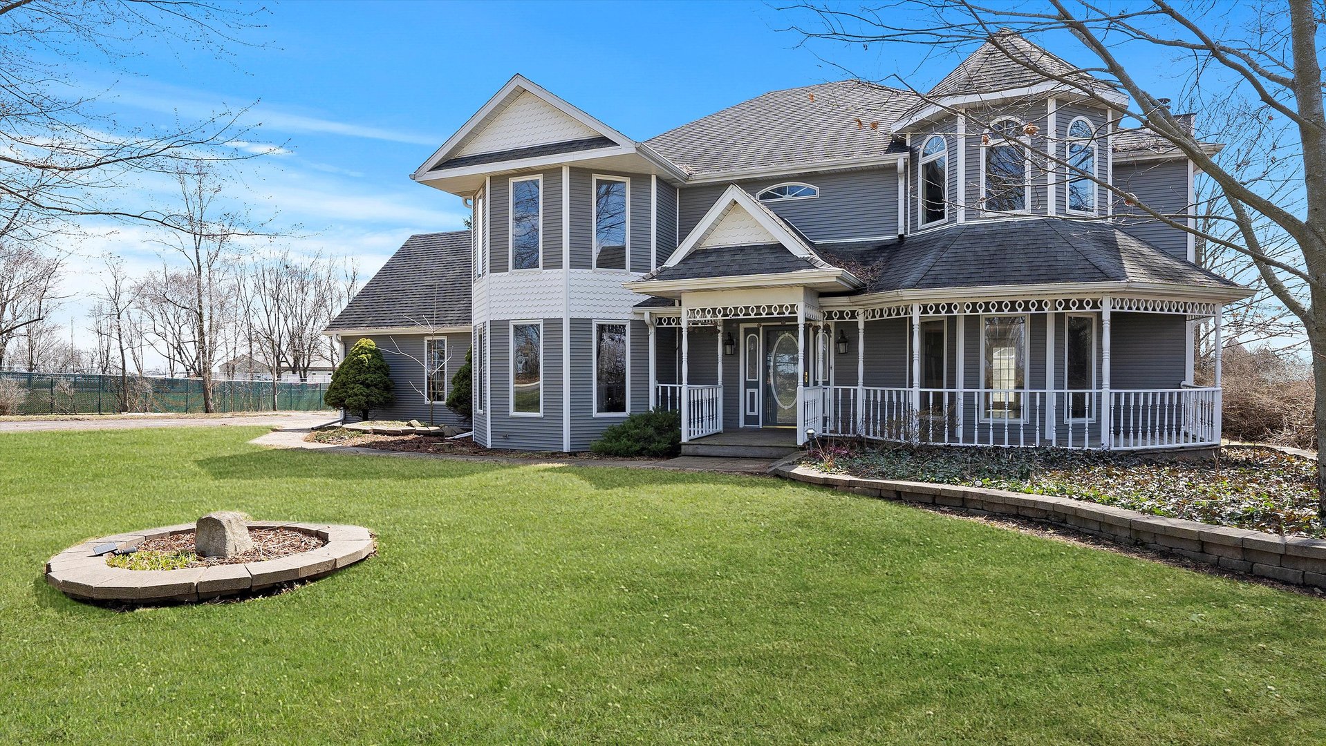 Undisclosed Address Elwood, IL 60421 - Photo 3 of 41 a front view of a house with a yard