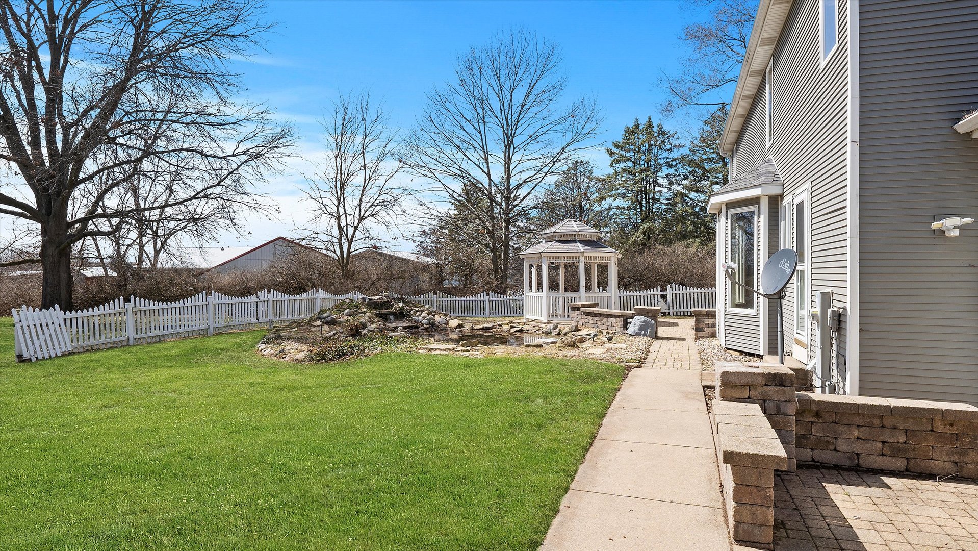 Undisclosed Address Elwood, IL 60421 - Photo 39 of 41 a view of a backyard with sitting area