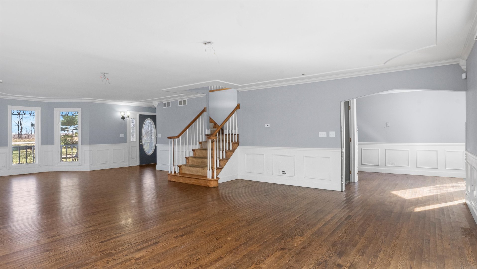 Undisclosed Address Elwood, IL 60421 - Photo 7 of 41 a view of an entryway with wooden floor