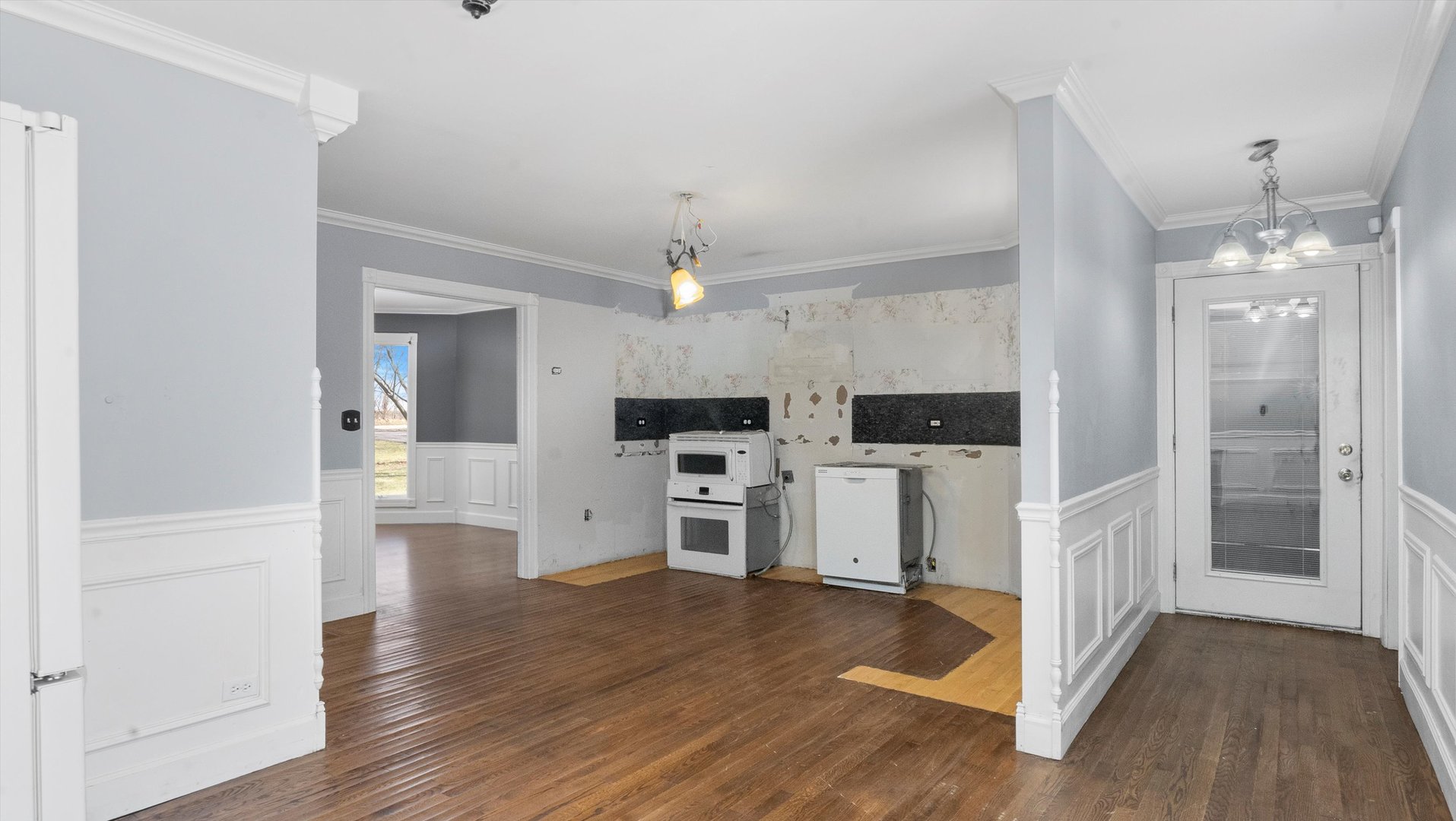 Undisclosed Address Elwood, IL 60421 - Photo 10 of 41 a open kitchen with white cabinets and stainless steel appliances