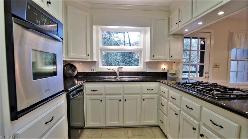 3020 Prytania Road Winston-Salem, NC 27106 - Photo 8 of 29 Granite counters and Gas cooktop
