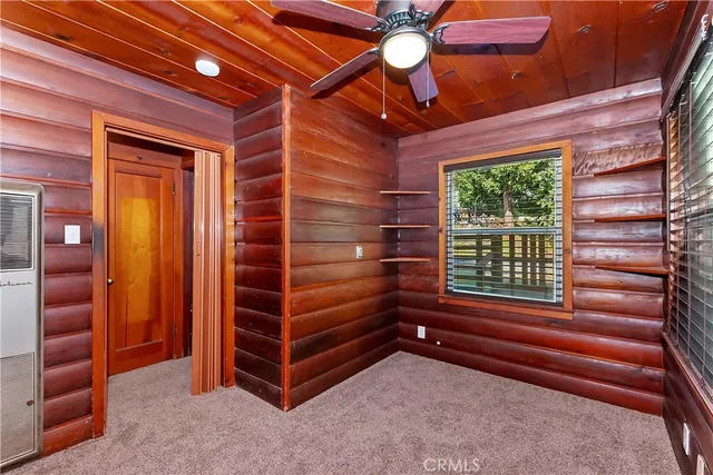 a room with furniture and a chandelier