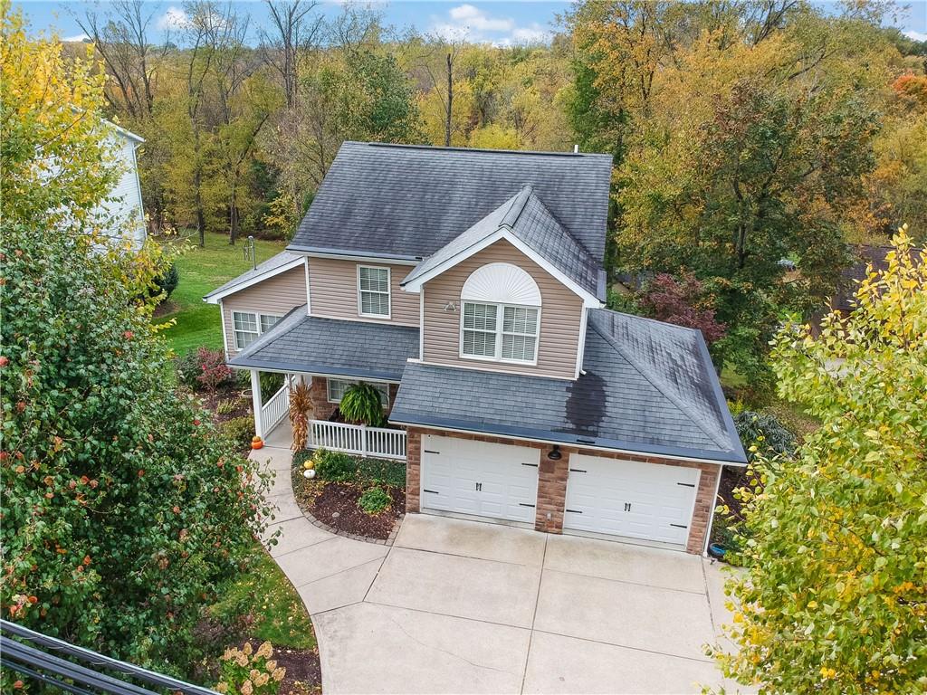 4201 Battle Ridge Road McDonald, PA 15057 - Photo 2 of 50 a aerial view of a house next to a yard