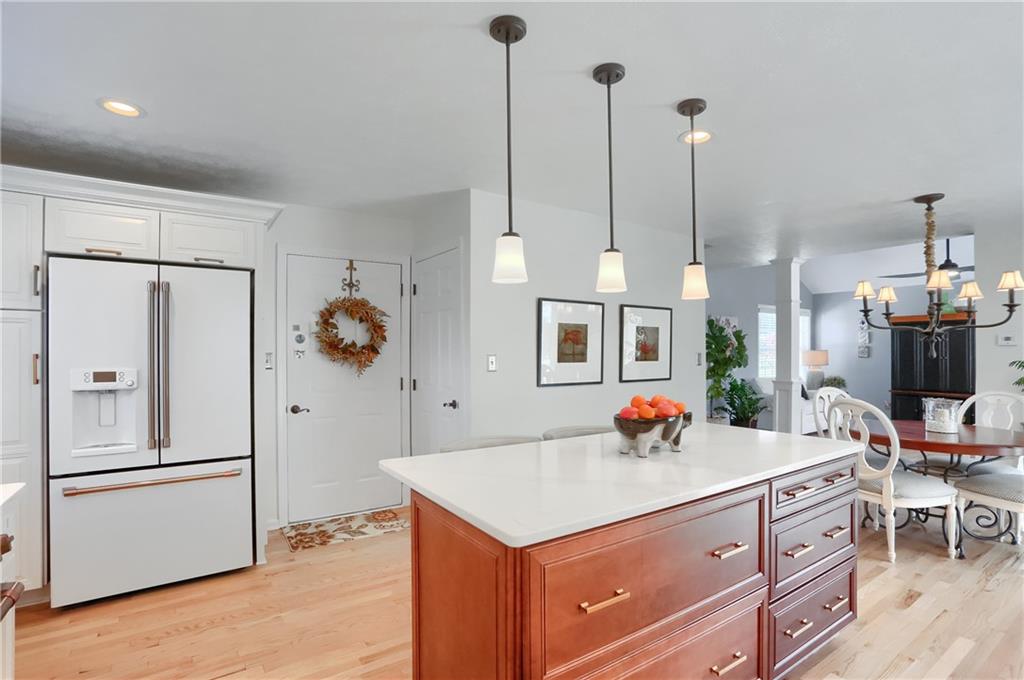 4201 Battle Ridge Road McDonald, PA 15057 - Photo 21 of 50 a kitchen with stainless steel appliances kitchen island granite countertop a refrigerator a sink and dishwasher