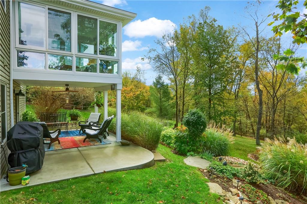 4201 Battle Ridge Road McDonald, PA 15057 - Photo 25 of 50 a view of a chair and table in backyard of the house