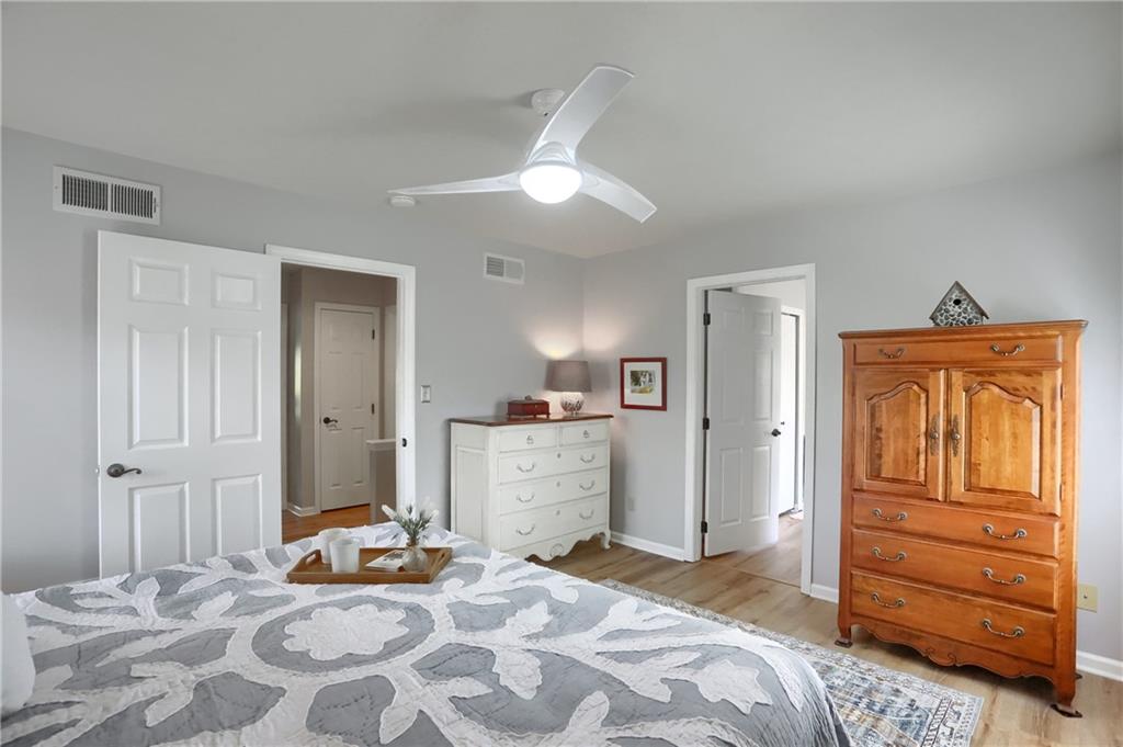 4201 Battle Ridge Road McDonald, PA 15057 - Photo 31 of 50 a bedroom with a bed and wooden floor