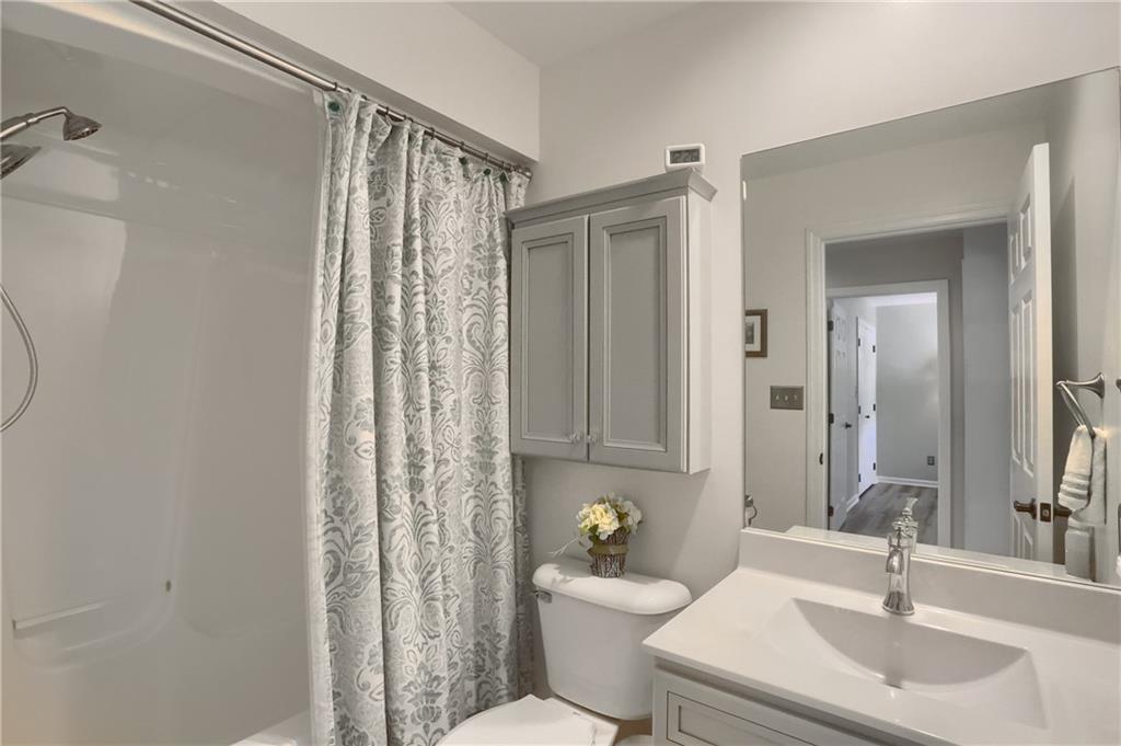 4201 Battle Ridge Road McDonald, PA 15057 - Photo 36 of 50 a bathroom with a sink a toilet and shower