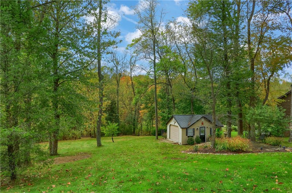 4201 Battle Ridge Road McDonald, PA 15057 - Photo 45 of 50 a view of a house with a big yard and large trees