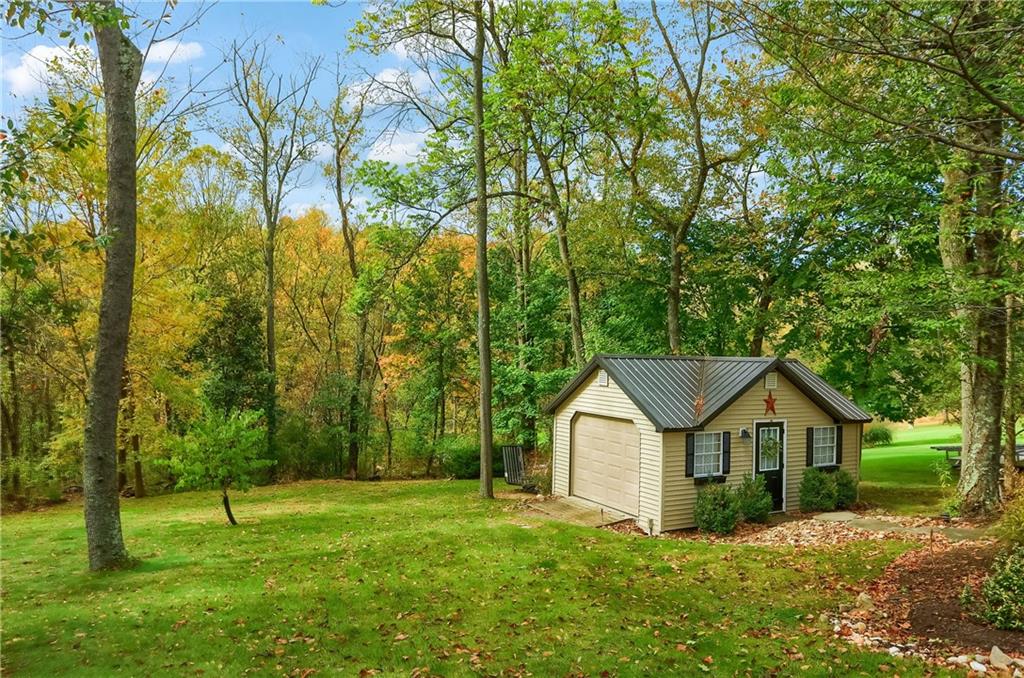4201 Battle Ridge Road McDonald, PA 15057 - Photo 47 of 50 a house with trees in the background