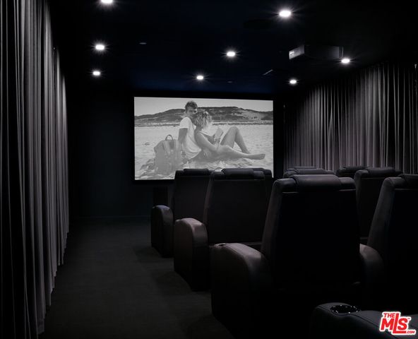 a view of a projector room with furniture